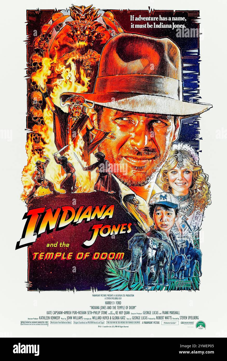 Indiana Jones and the Temple of Doom (1984) von Steven Spielberg mit Harrison Ford, Kate Capshaw und Ke Huy Quan. Ein Archäologe betritt einen antiken Tempel in Indien, um einen heiligen Stein zu bergen und versklavte Kinder zu retten. Foto eines Original-Posters aus dem Jahr 1984 mit einem Blatt aus den USA mit einem Kunstwerk von Drew Struzan ***NUR ZUR REDAKTIONELLEN VERWENDUNG***. Quelle: BFA / Paramount Pictures Stockfoto