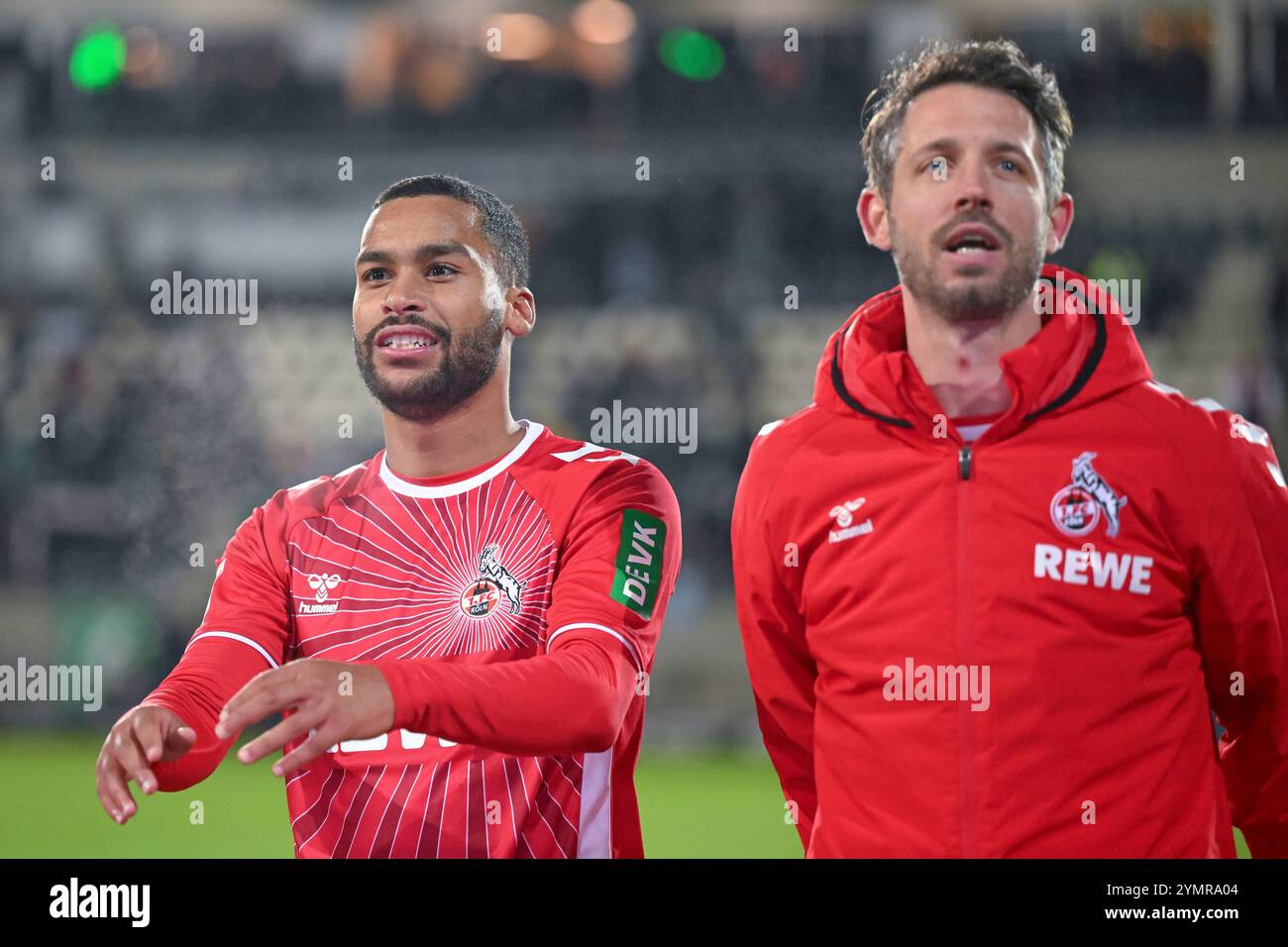 22.11.2024, Fußball, 2. Bundesliga, 13. Spieltag Saison 2024/2025, Preußen Münster - 1.FC Köln, Elias Bakatukanda (1. FC Köln), Mark uth (1. FC Köln) Foto: Teresa Kroeger/RHR-Foto Credit: dpa Picture Alliance/Alamy Live News Stockfoto