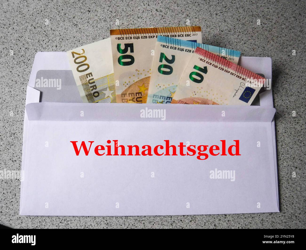 Stockbilder 09/2024 Briefumschlag mit Aufdruck Weihnachtsgeld Henstedt-Ulzburg Schleswig-Holstein Deutschland *** Stockfotos 09 2024 Briefumschlag mit Aufdruck Weihnachtsbonus Henstedt Ulzburg Schleswig Holstein Deutschland Copyright: XLobeca/RalfxHomburgx Stockfoto