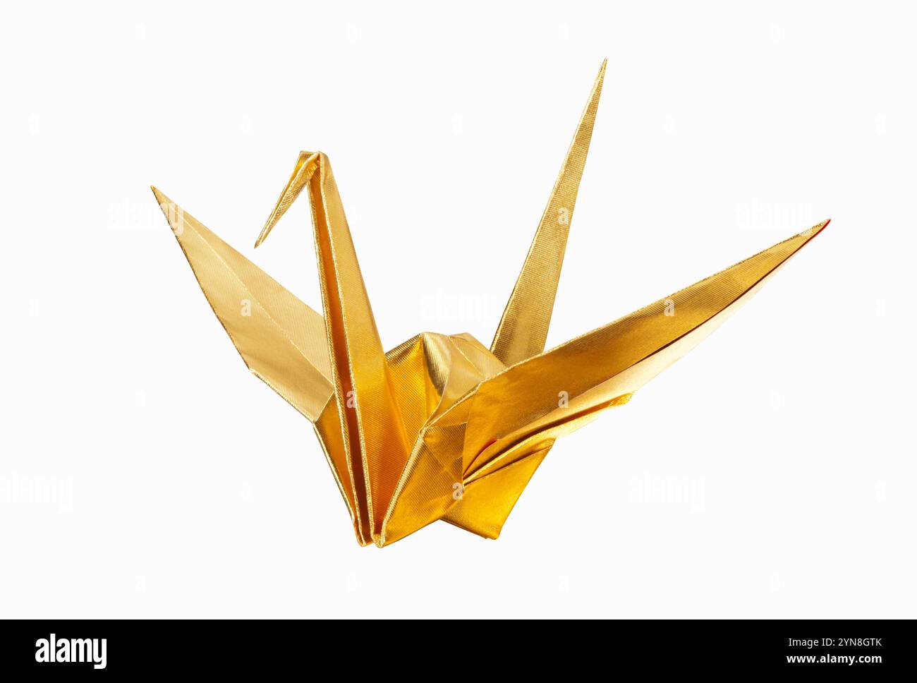 Papierkran aus goldenem Origami Stockfoto