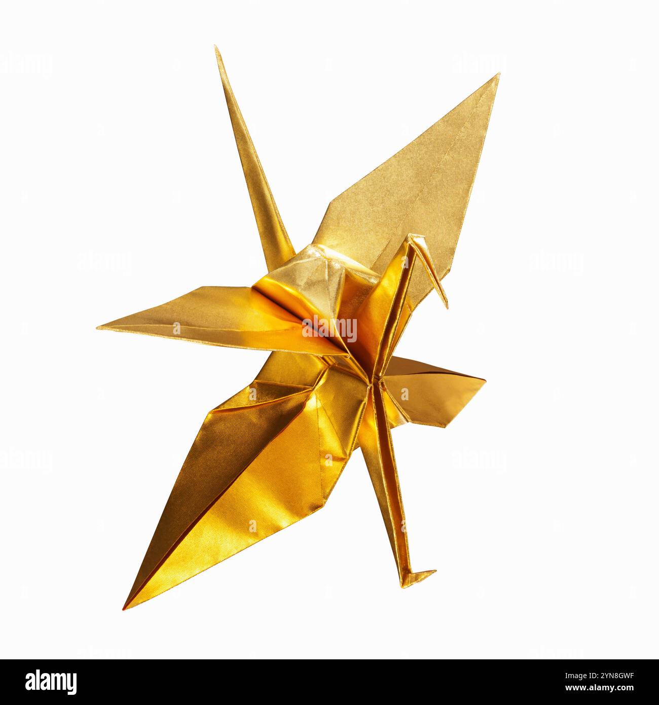 Papierkran aus goldenem Origami Stockfoto