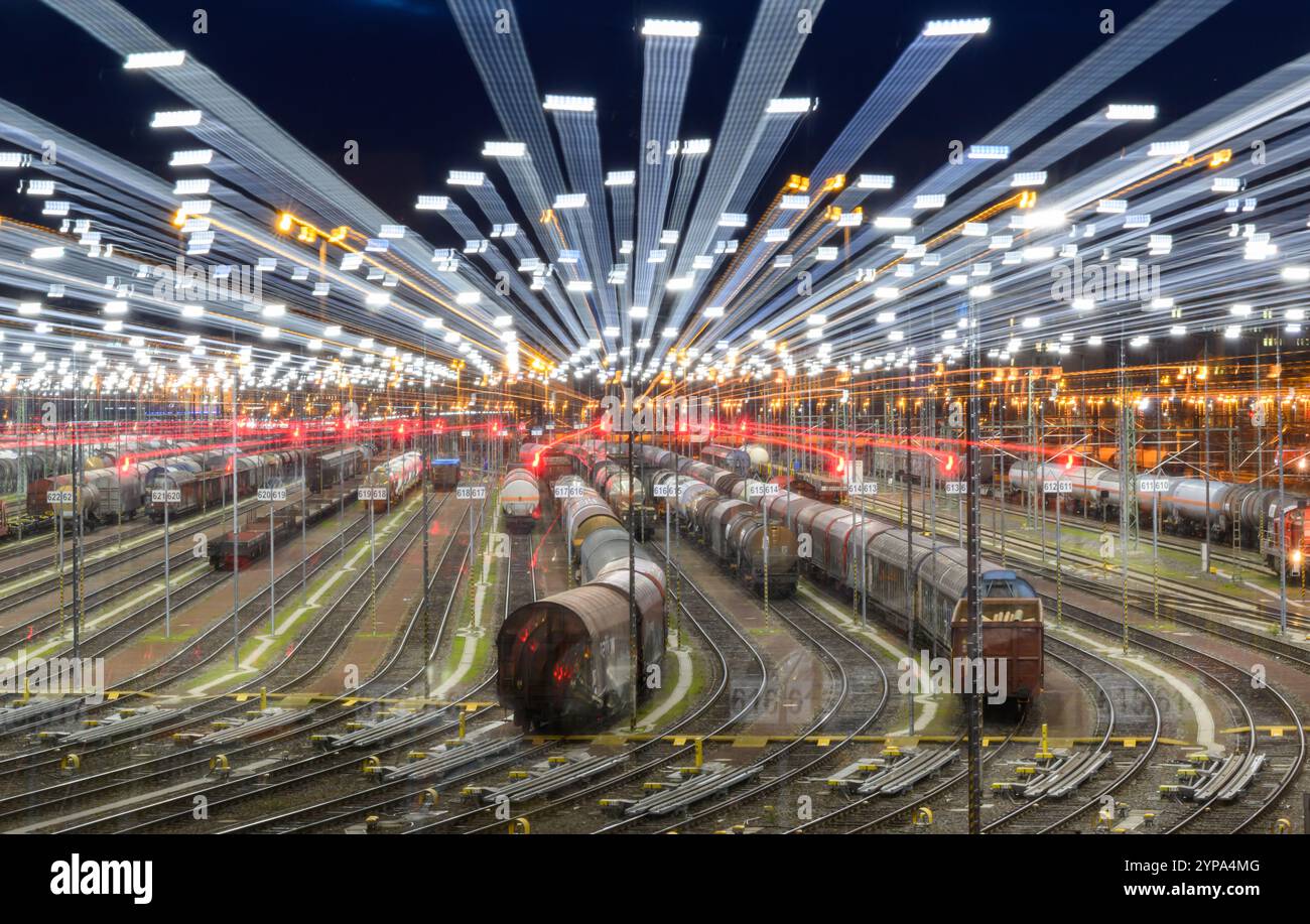 PRODUKTION - 26. November 2024, Sachsen-Anhalt, Halle (Saale): Güterwagen stehen auf dem Bahnformationsbahnhof im Rangierbahnhof Halle/Saale (Foto mit Zoom-Effekt). Die Anlage ist eine der modernsten ihrer Art in Europa. Der Bahnknotenpunkt Halle/Saale ist ein wichtiger Knotenpunkt für den Güter- und Personenverkehr in Mitteldeutschland. Foto: Hendrik Schmidt/dpa Stockfoto