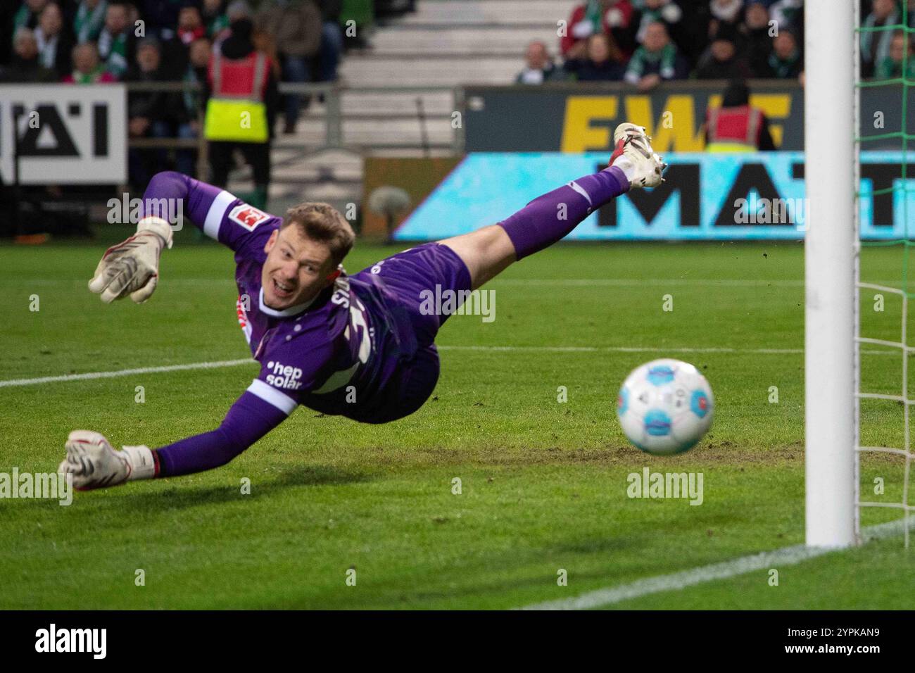 Torwart Alexander NUEBEL Nübel S Aktion, Paradew, Fussball 1. Bundesliga, 12. Spieltag, SV Werder Bremen HB - VfB Stuttgart S 2-2 am 09.11.2024 in Bremen/Deutschland. DFL-Vorschriften verbieten jede Verwendung von Fotografien als Bildsequenzen und/oder Quasi-Video *** Torhüter Alexander NUEBEL Nübel S Action, Paradew, Fußball 1 Bundesliga, Spieltag 12, SV Werder Bremen HB VfB Stuttgart S 2 2 am 09 11 2024 in Bremen Deutschland die DFL-Vorschriften verbieten jede Verwendung von Fotografien als Bildsequenzen und/oder Quasi-Video Stockfoto