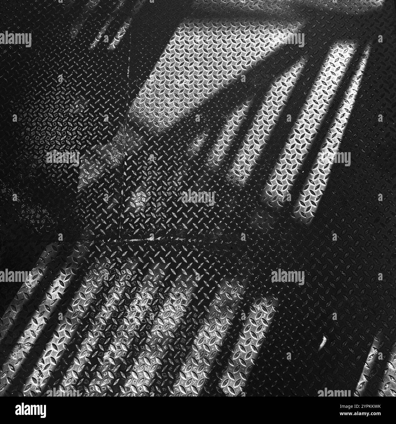 Abstrakte Schatten und Texturen über ein industrielles Laufbahnkonzept Stockfoto