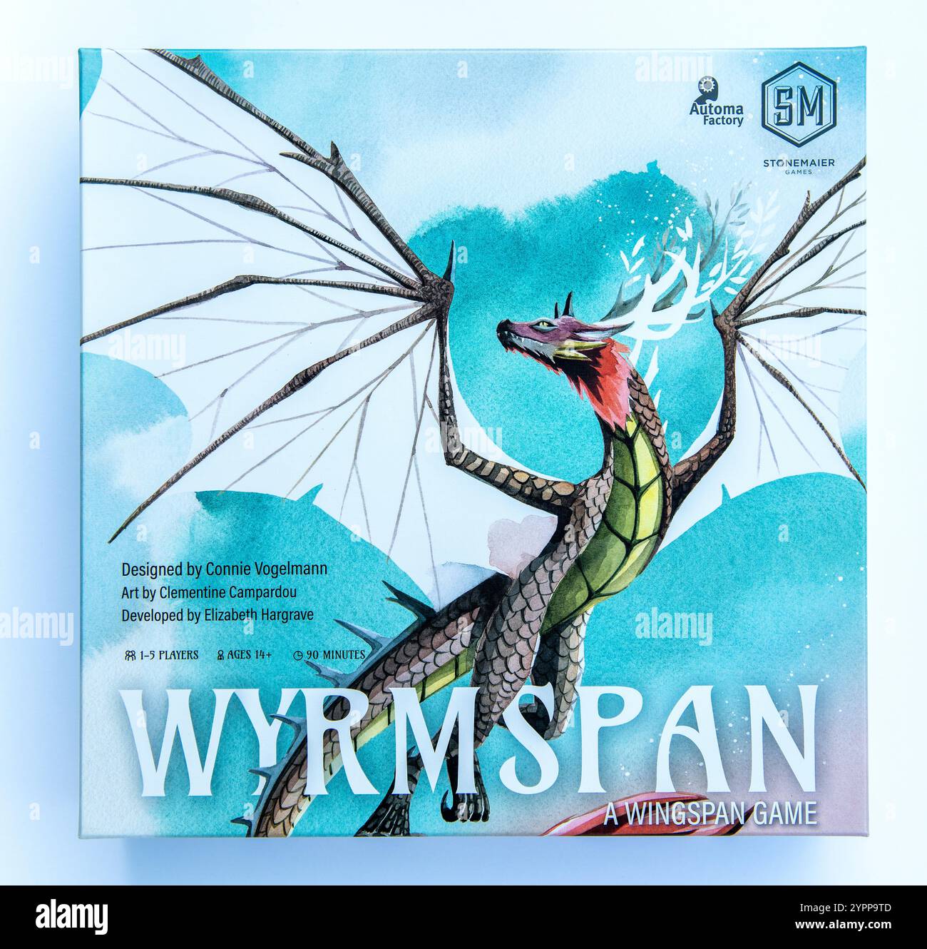 Box mit dem Wyrmspan-Brettspiel, bei dem ein Zufluchtsort für Drachen gebaut wird Stockfoto