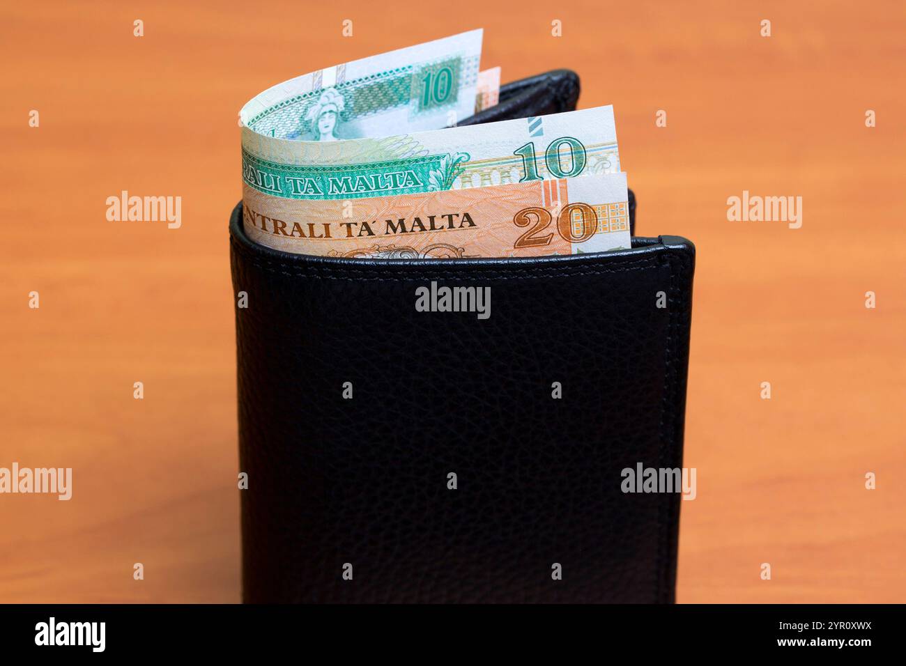 Maltesisches Geld - Lira in der schwarzen Brieftasche Stockfoto