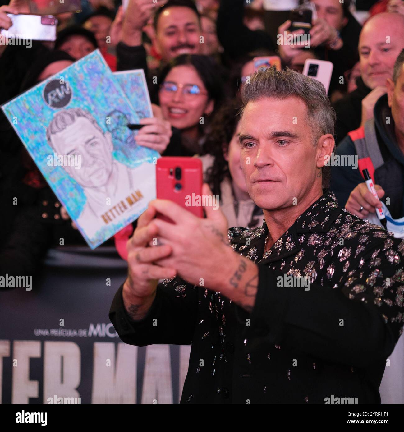 Sänger Robbie Williams besucht die Premiere von Better man im Capitol-Kino am 4. Dezember 2024 in Madrid. Stockfoto