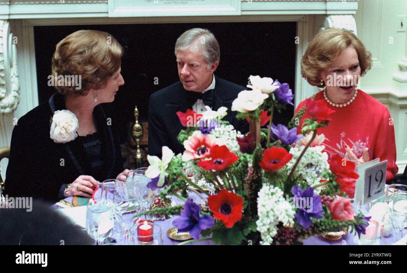 Präsident Carter und Premierministerin Margaret Thatcher aus Großbritannien vertieften Gesprächen während des Staatsessens im Weißen Haus, das ihr zu Ehren 1979 stattfand Stockfoto