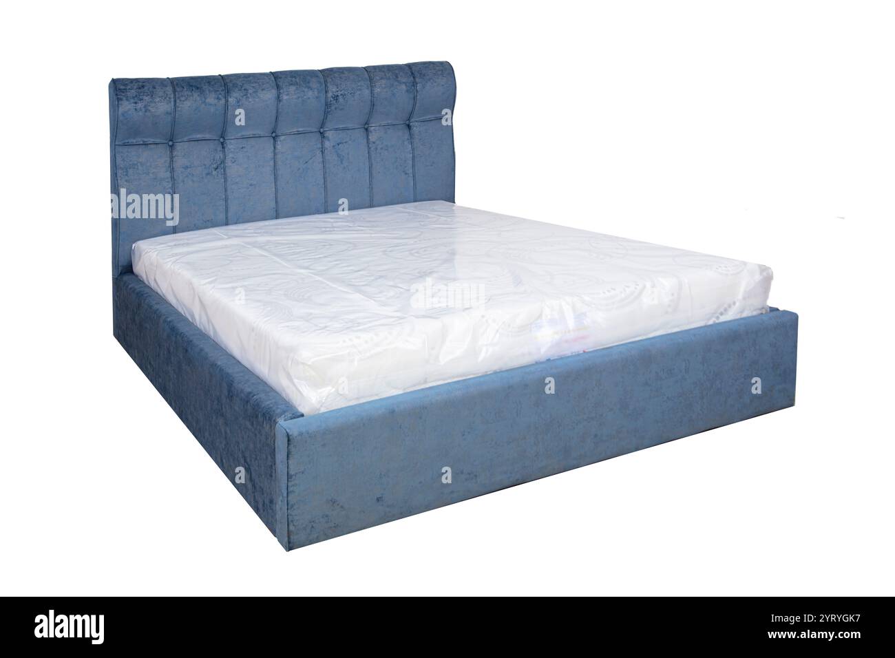 Doppelbett mit weichem Kopfteil. Gepolsterte Möbel. Stockfoto