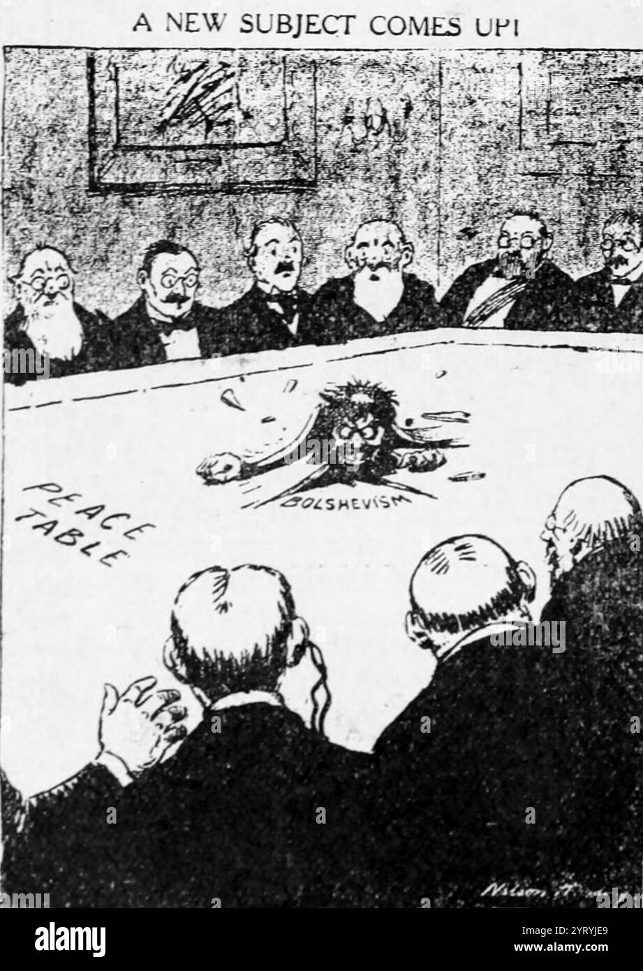 Die erste Rote Angst in den Vereinigten Staaten begleitete die Russische Revolution von 1917 (Oktoberrevolution) und kommunistische Revolutionen in Europa und darüber hinaus. Ein politischer Cartoon aus dem Jahr 1919, der die Auswirkungen der Oktoberrevolution auf die Pariser Friedenskonferenz (Versailles) darstellt. Stockfoto
