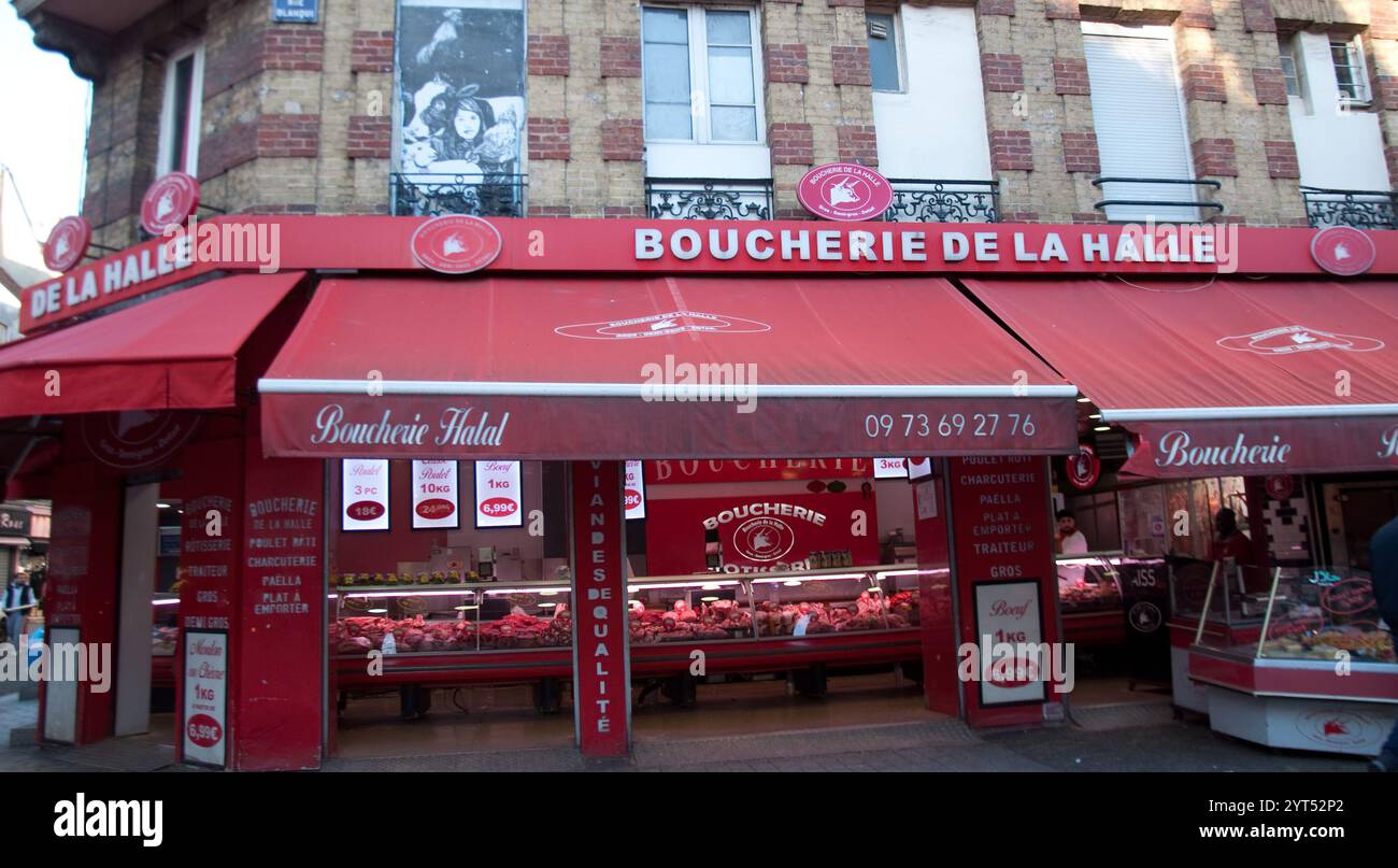 Große Halal-Metzger, St Denis, Paris, Frankreich - attraktive rote Markisen; Halal-Metzger; Stockfoto