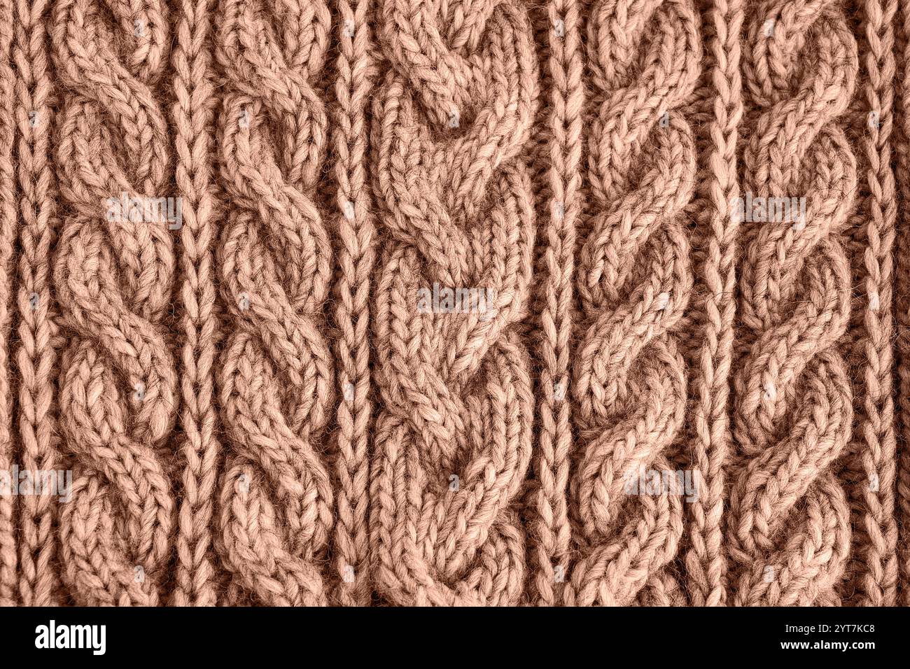 Braune Mokka-Mokafarbe gestrickte Textur. Strickwaren handgefertigt. Abstrakt, Hintergrund Stockfoto