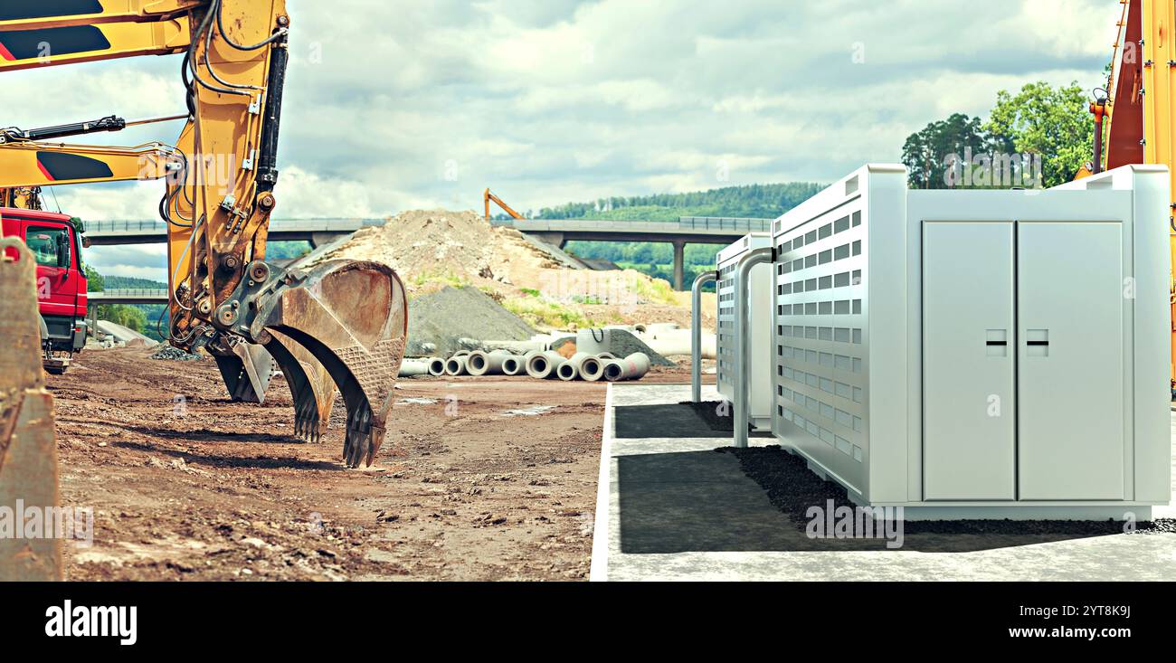 Baumaschinen auf einer Baustelle eines modernen Solarfield mit Batteriespeicher Stockfoto