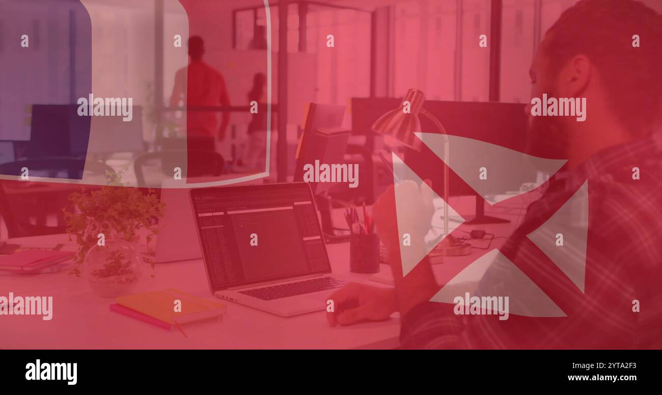 Bild der Flagge von wallis und futuna über dem kaukasischen Geschäftsmann mit Laptop Stockfoto