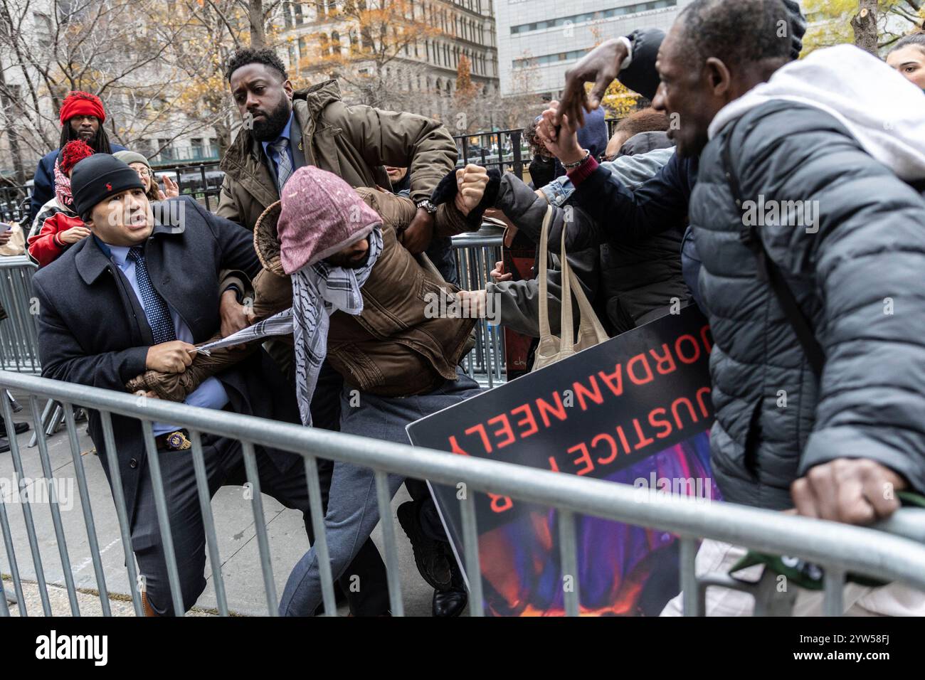 A person protesting the not guilty verdict of Daniel Penny is arrested ...