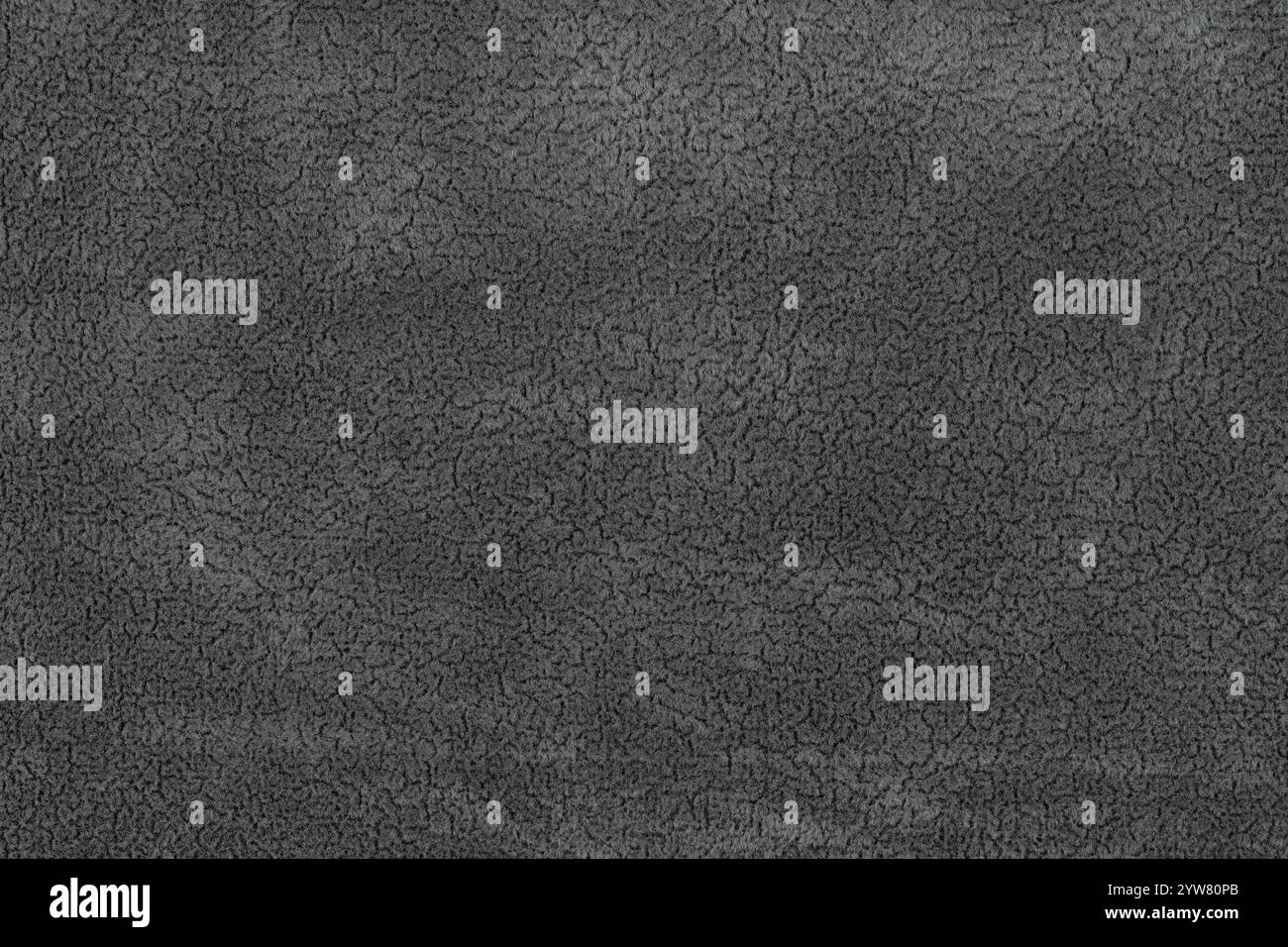 Schwarzes Stofftuch mit kurzem flauschigem und weichem Hintergrund mit abstrakter Textur. Nahaufnahme dunkelgrauer Oberflächengücher Stockfoto