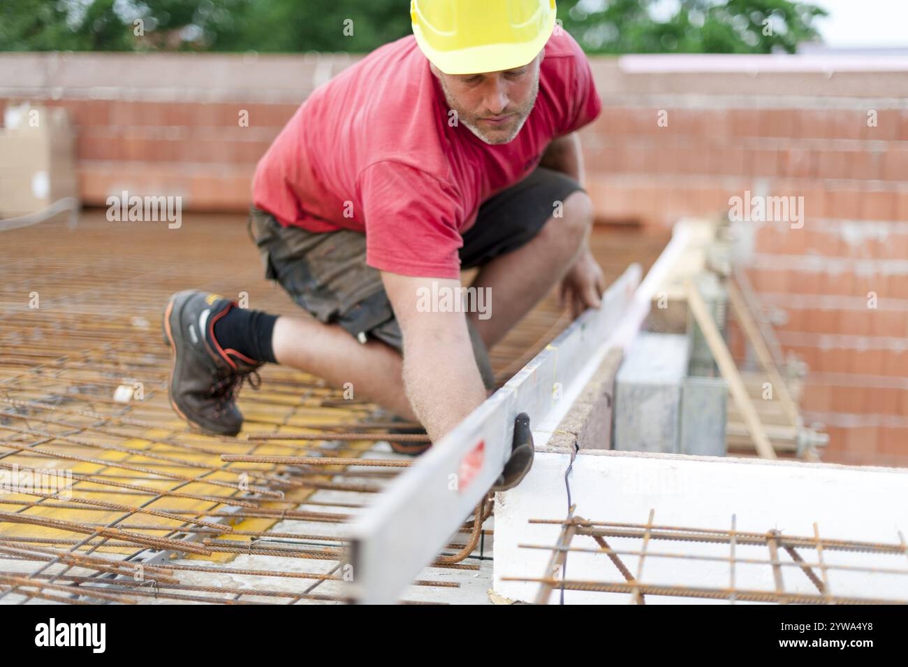 Bauarbeiter am Bau, Bauarbeiter auf dem Baugelaende Stockfoto