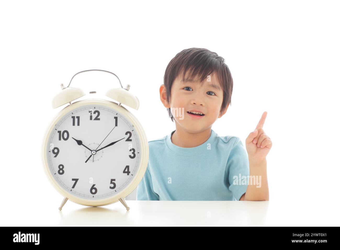 Uhr und Junge Porträt Stockfoto