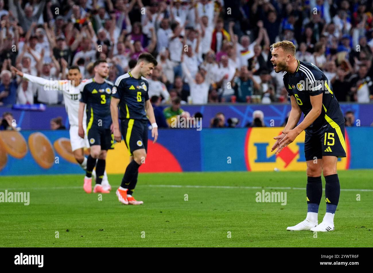 Aktenfoto vom 14.06.2024 von Ryan Porteous aus Schottland, der nach Deutschland-Score reagiert. Gastgeber Deutschland schlug 10-Mann Schottland 5-1 im Eröffnungsspiel der Euro 2024 in München. Ausgabedatum: Donnerstag, 12. Dezember 2024. Stockfoto