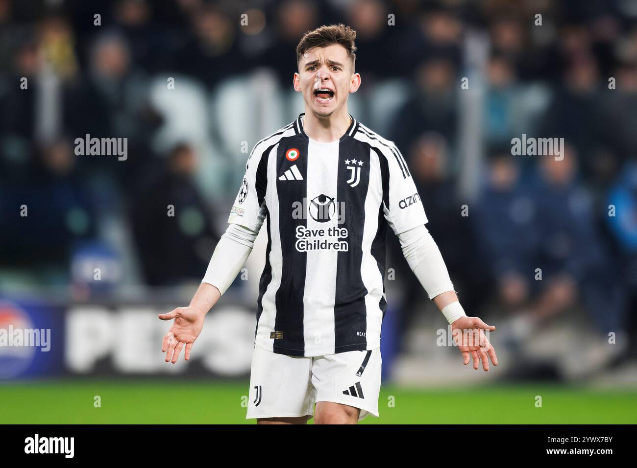 Turin, Italien. 11. Dezember 2024. Francisco Conceicao von Juventus FC reagiert während des Fußballspiels der UEFA Champions League 2024/25 zwischen Juventus FC und Manchester City FC. Quelle: Nicolò Campo/Alamy Live News Stockfoto