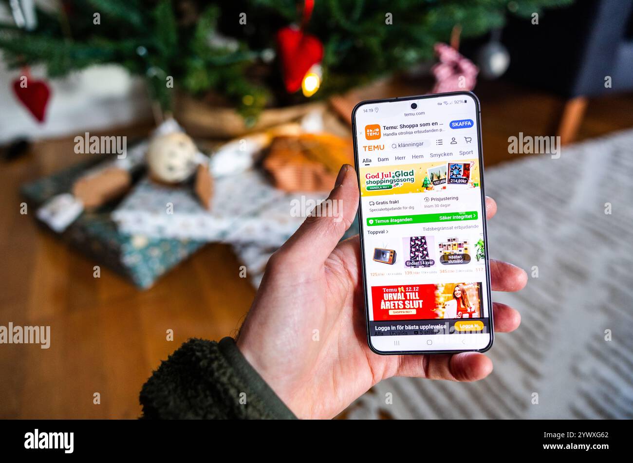 Schilder und Symbole, Temu, ein Online-Marktplatz des chinesischen E-Commerce-Unternehmens PDD Holdings, das Colin Huang gehört. Stockfoto