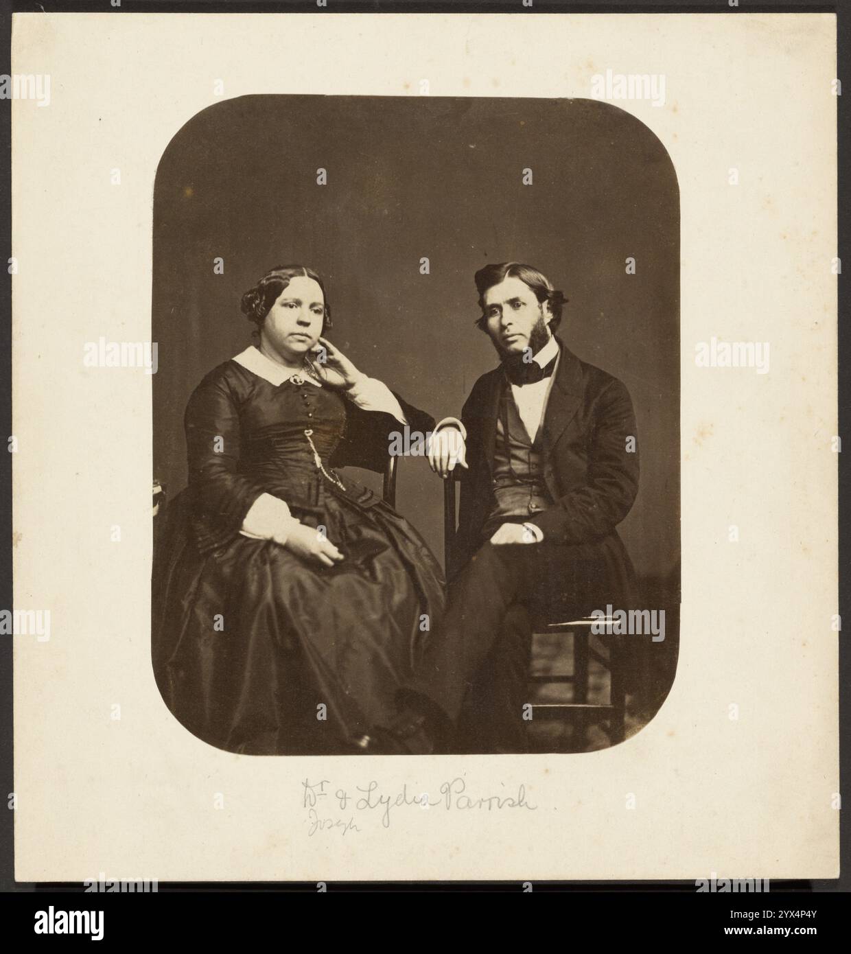 Dr. Joseph und Lydia Parrish, 1860er Jahre Porträt einer Frau und eines Mannes, die nebeneinander auf Stühlen sitzen. Stockfoto