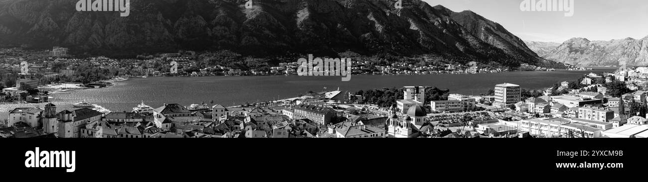 Kotor, Montenegro - 14. Februar 2024: Blick auf die Küste an einem sonnigen Wintertag in der Bucht von Kotor von der mittelalterlichen Festung auf einem Hügel, Adriaküste von Montene Stockfoto