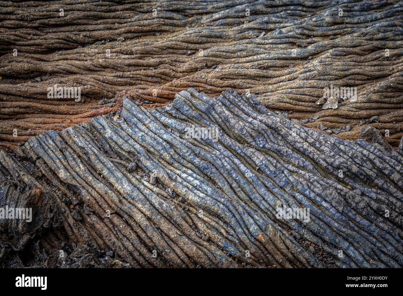 Pahoehoe Lavafluss, der glatte, seidige Textur und Muster offenbart Stockfoto