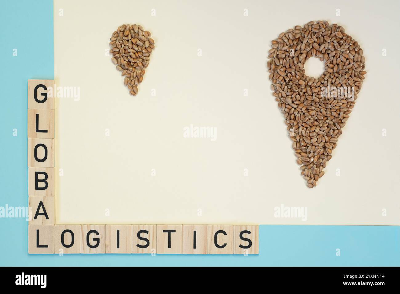 Die Standortblase aus Weizenkörnern. Ein Symbol für eine große Nadel mit einer kleinen Nadel. Inschrift Global Logistics. Globale Logistik, Wirtschaft, Politik. Stockfoto