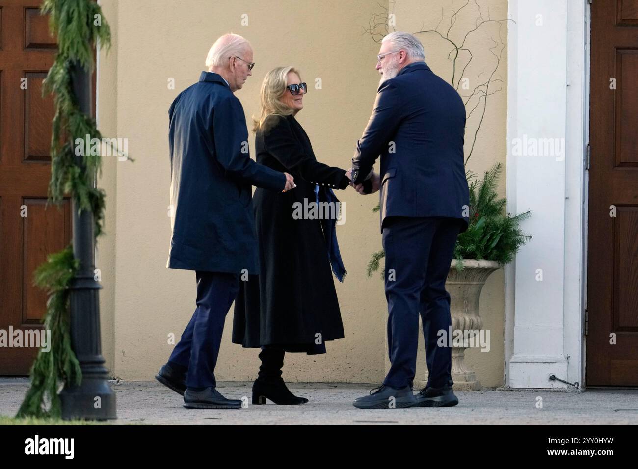 President Joe Biden and first lady Jill Biden are greeted as they
