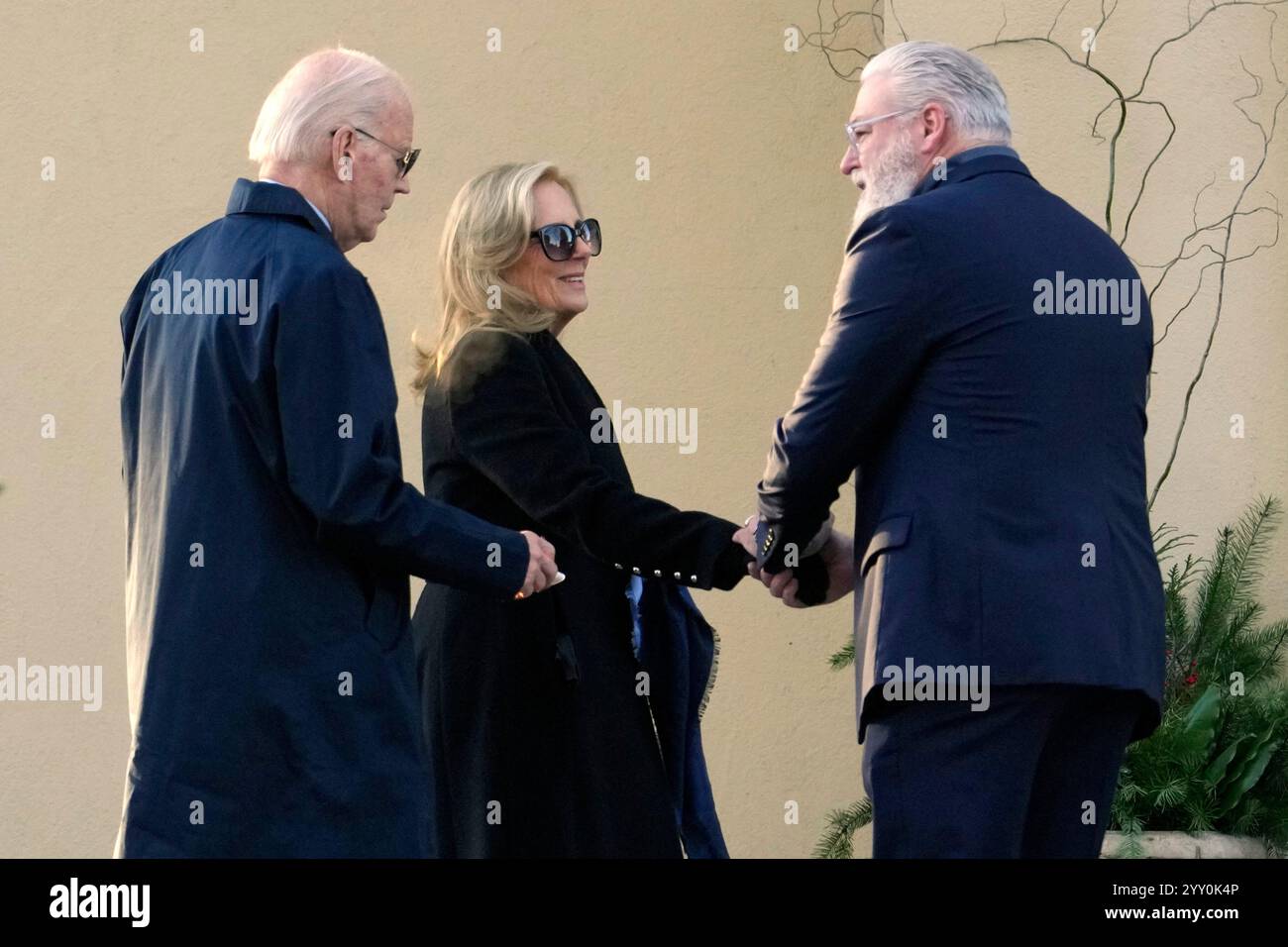 President Joe Biden and first lady Jill Biden are greeted as they