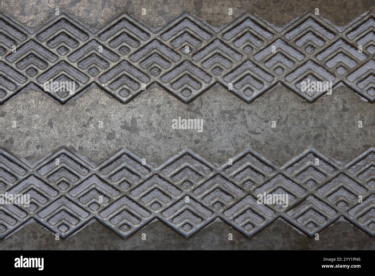 Metallischer Hintergrund in grauen und abgewinkelten Mustern. Verarbeitet mit gestapeltem Fokus und Tiefe Compositing. Stockfoto