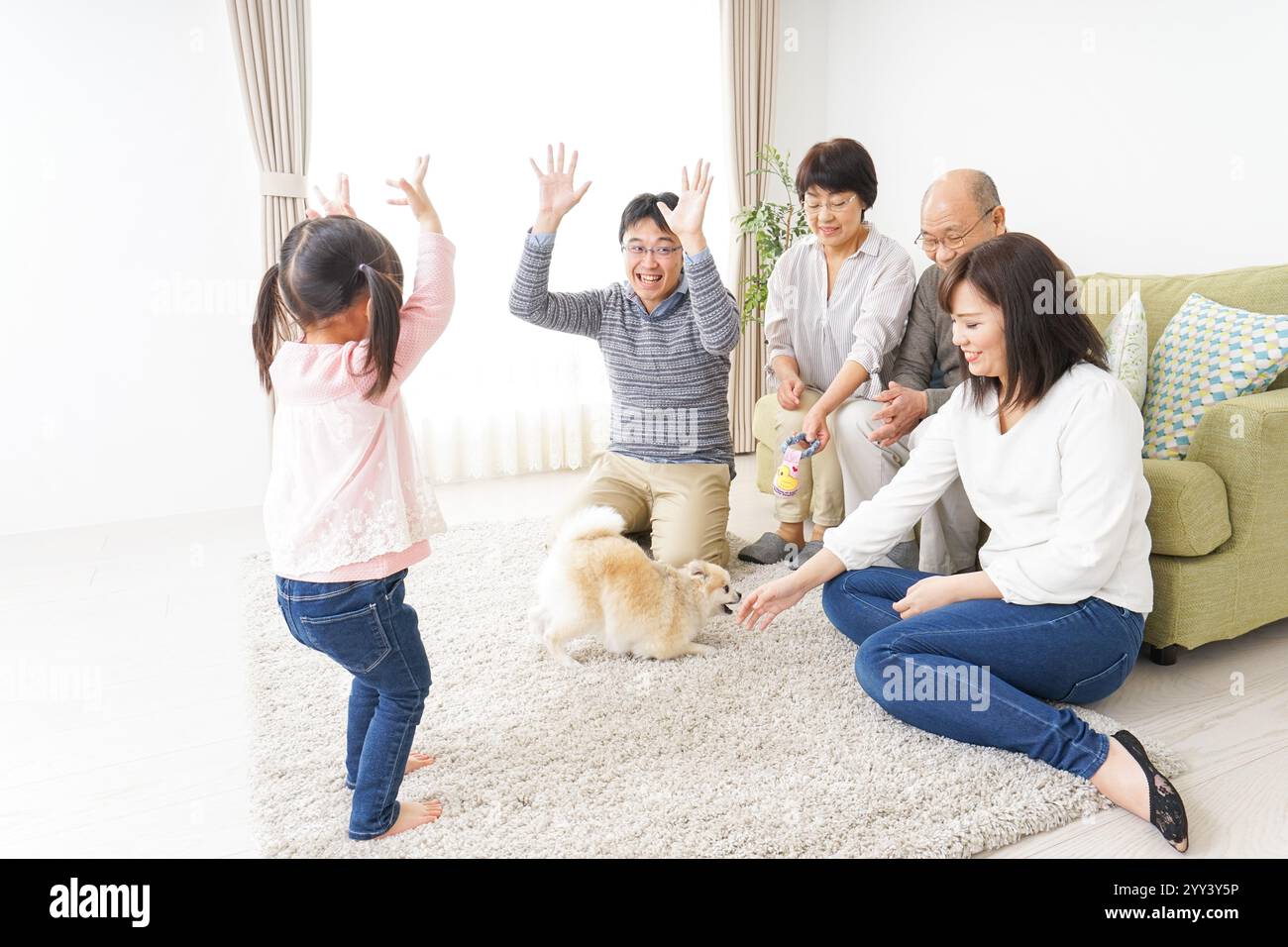 Glückliche Familie von drei Stockfoto