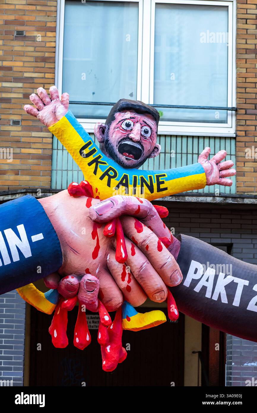 Düsseldorf, Deutschland. 3. März 2025. Der politische Karneval wurde von dem Designer Jacques Tilly geführt. Hitler-Stalin-Pakt 2,0. Putin und Trump quetschen Wolodymyr Zelenskyy aus. Foto: Vibrant Pictures/Alamy Live News Stockfoto