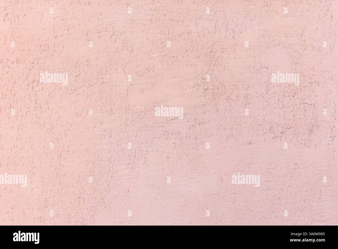 Hellrosa strukturierte Wandfläche mit dezenten Mustern, ideal für Hintergründe, kreative Designprojekte oder als dekoratives Element in Kunst und Grafik Stockfoto
