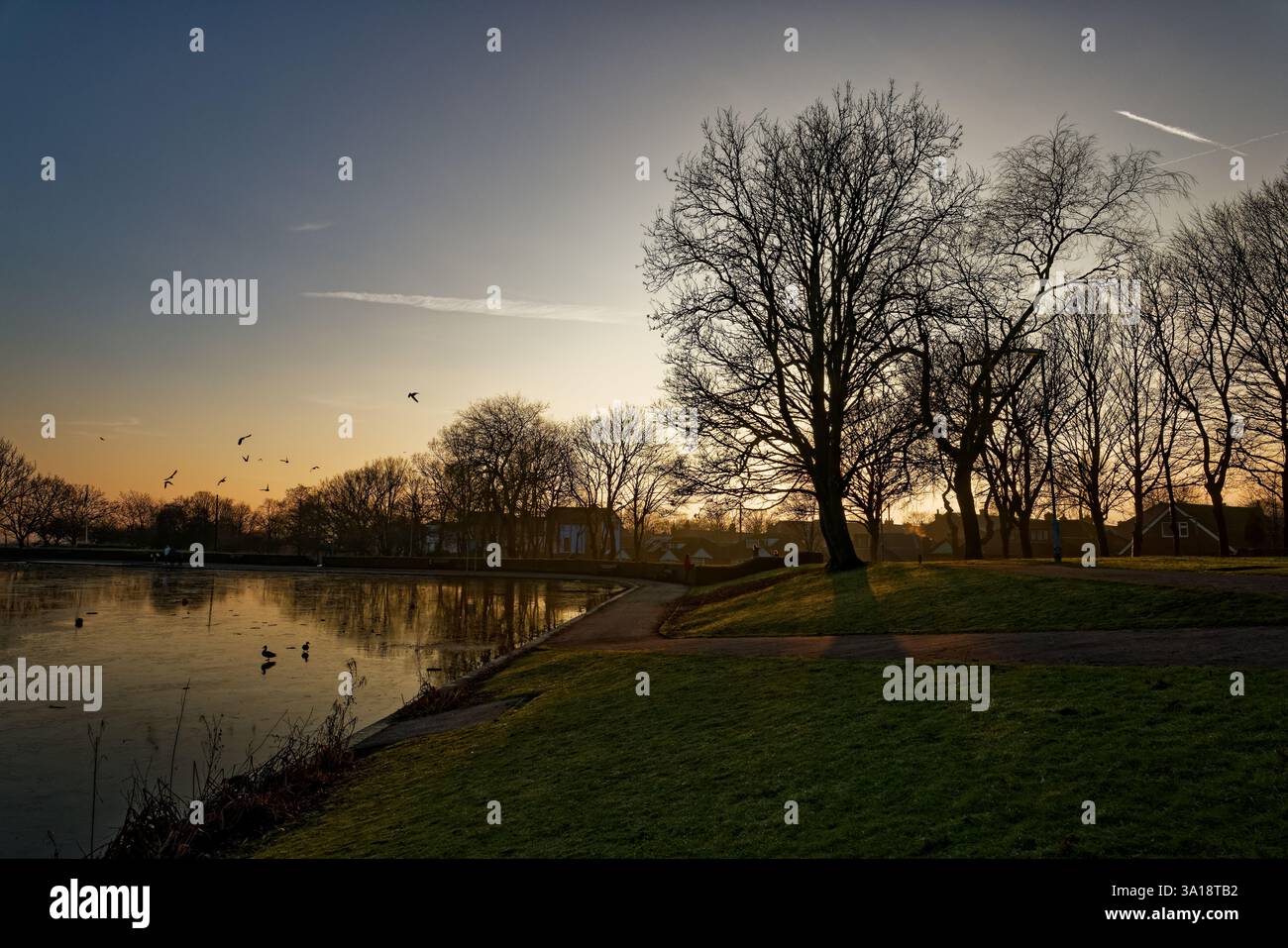Ende des Tages in einer Ecke von Clarence Park, Bury, Greater Manchester. Stockfoto