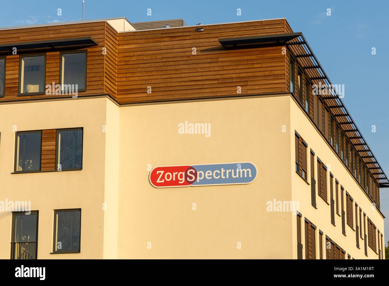ZorgSpectrum Logo-Zeichen. Zorg Spectrum unterstützt Menschen, die im Alltag Einschränkungen erleben. Stockfoto