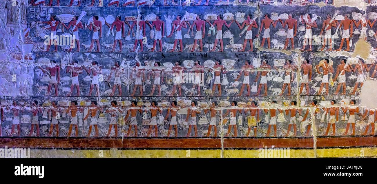 Lange Prozessionen von Männern, die die Produkte aus dem Besitz des Wesirs als Opfergabe an Mehu brachten Stockfoto