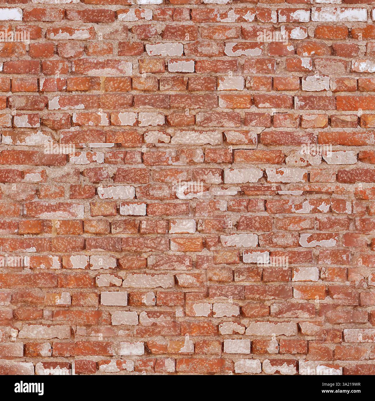 Alte rote Ziegelwand, die Abnutzung und Verschleiß durch Witterung zeigt Stockfoto