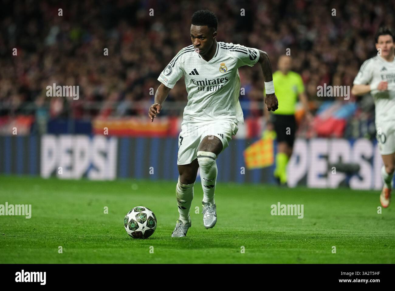 Vinícius Junior von Real Madrid während des UEFA Champions League Spiels Atletico de Madrid und Real Madrid spielten am 12. März das Metropolitano Stadium Stockfoto