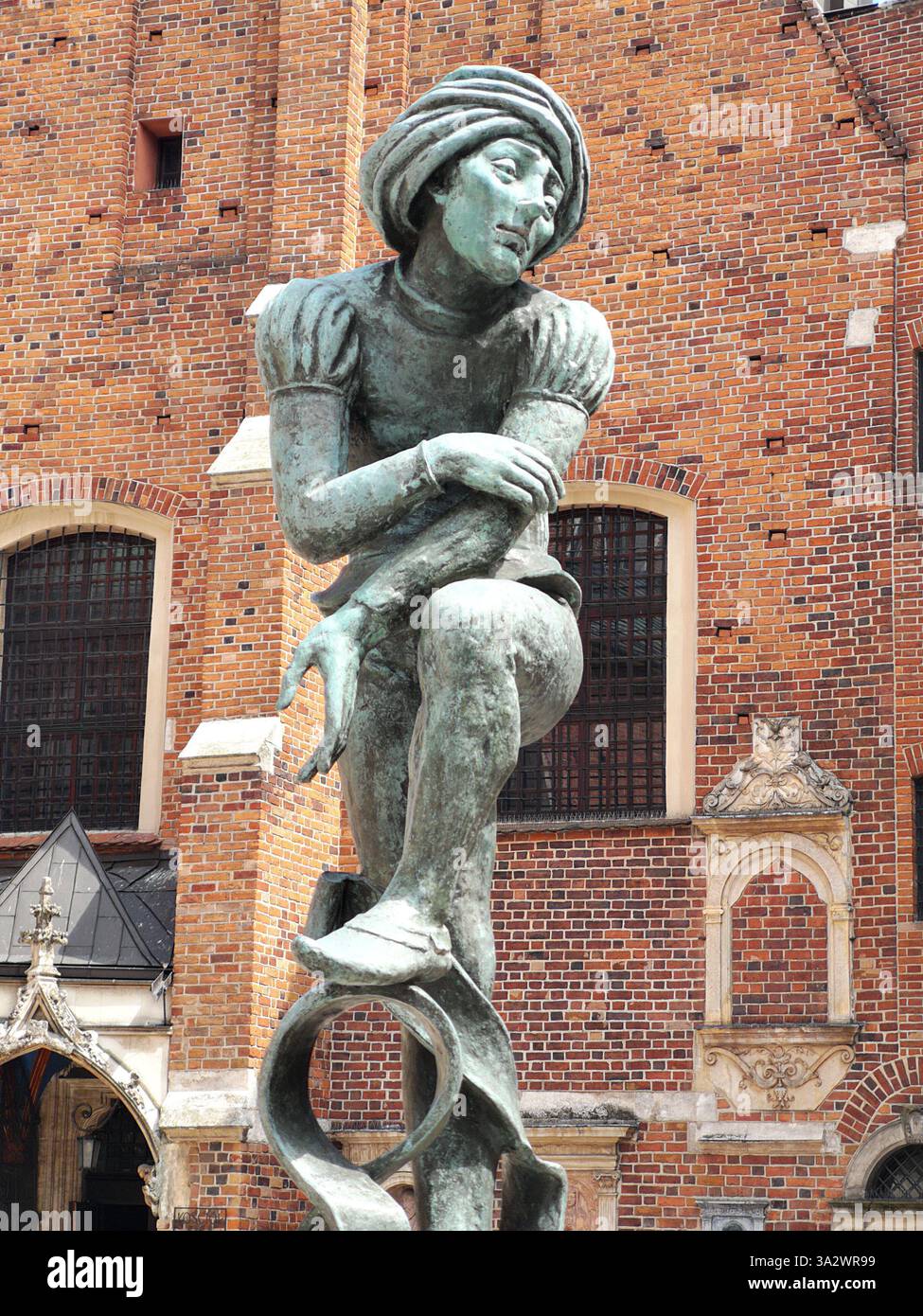 Brunnen des Studenten Zak in der Nähe der Marienkirche, Kraków, Polen – skurrile Skulptur auf dem Plac Mariacki neben der gotischen Kirche in der historischen Altstadt. Stockfoto