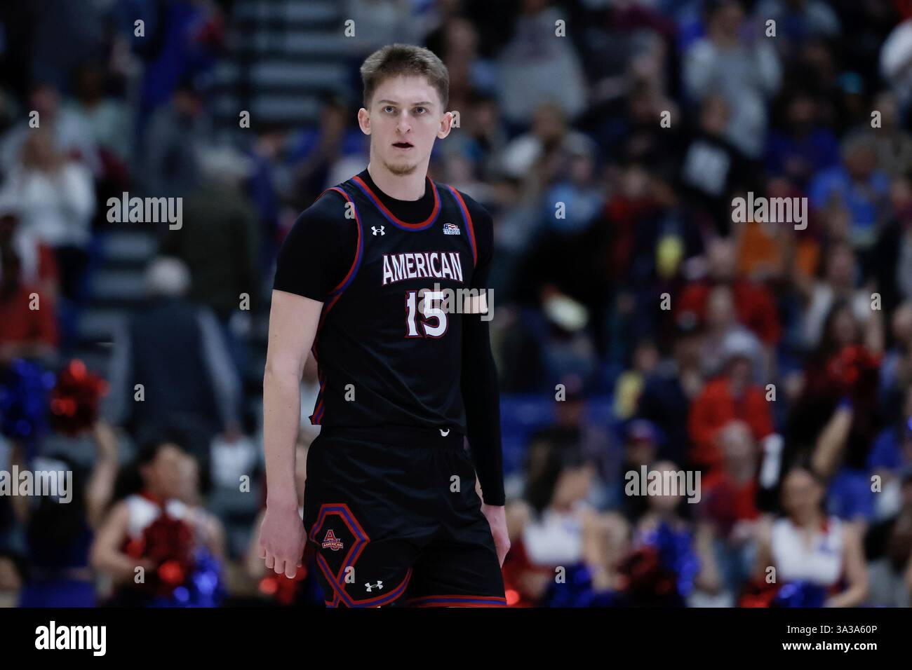 American forward Matt Rogers (15) looks on during an NCAA college basketball game in the championship of the Patriot League tournament against Navy, Wednesday, March 12, 2025, in Washington. (AP Photo/Terrance Williams) Stockfoto