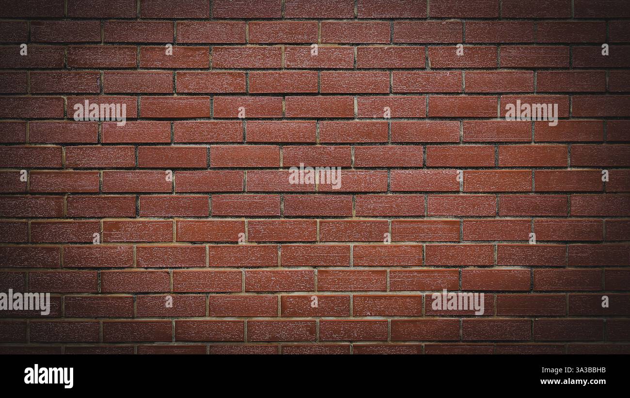 Betonwand aus rotem Ziegelstein Stockfoto