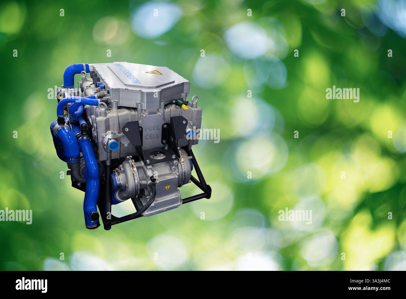Wasserstoff-Brennstoffzellenmotor auf grünem Hintergrund. Stockfoto