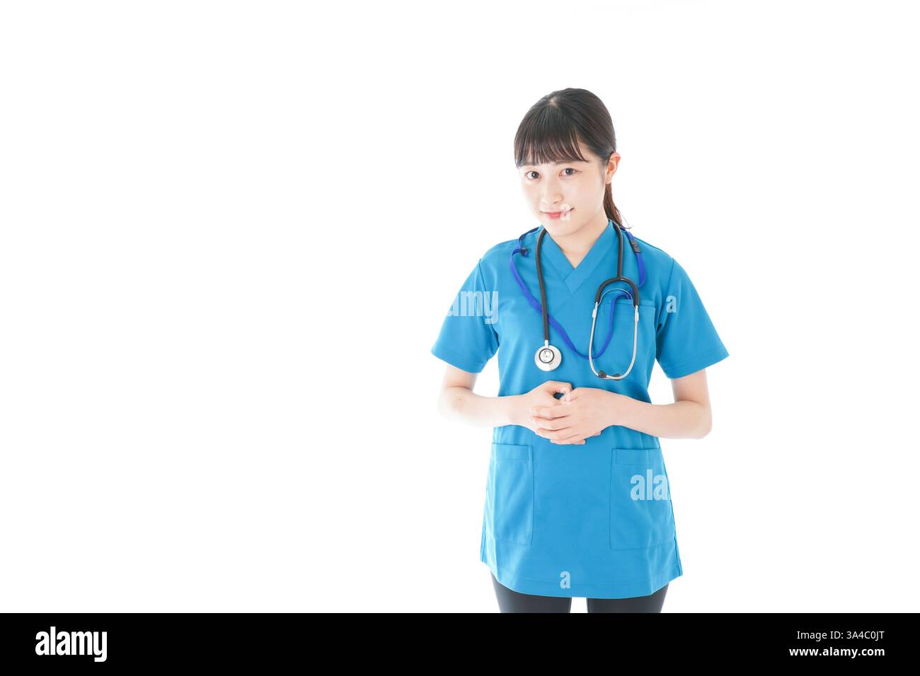 Lächelnde junge Krankenschwester Stockfoto