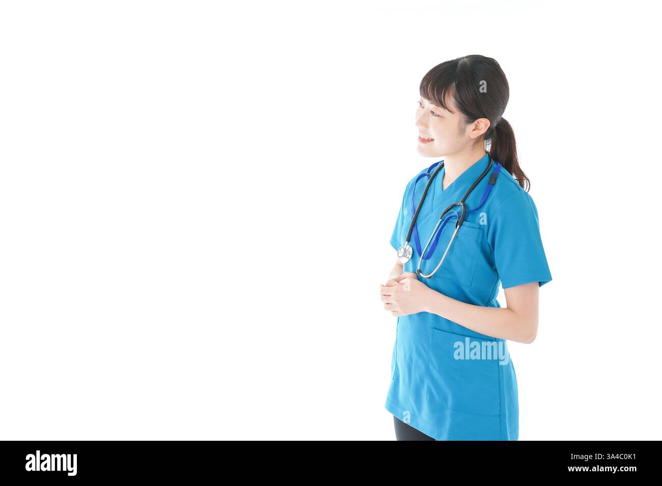 Lächelnde junge Krankenschwester Stockfoto