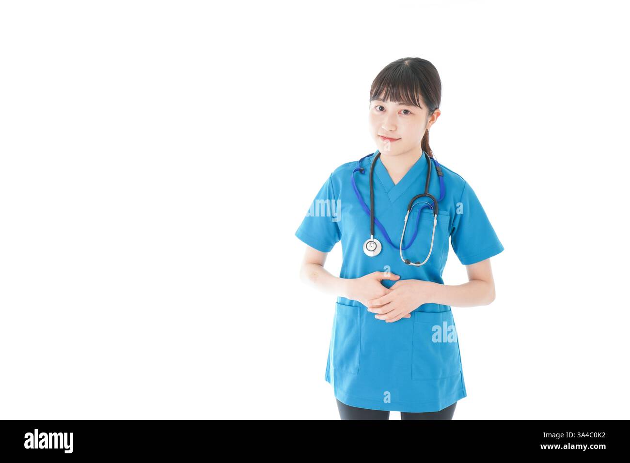 Lächelnde junge Krankenschwester Stockfoto