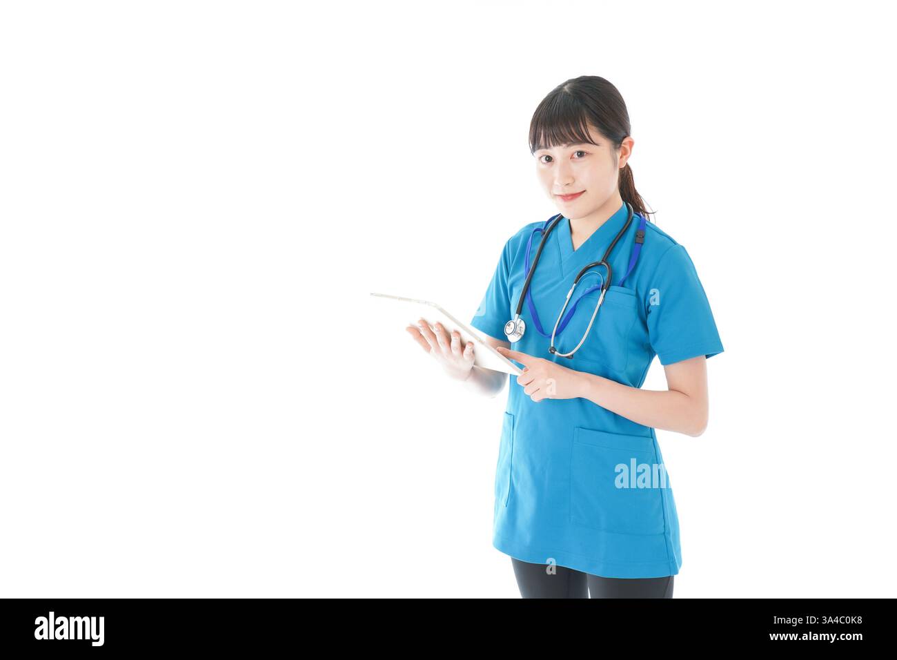 Lächelnde junge Krankenschwester Stockfoto