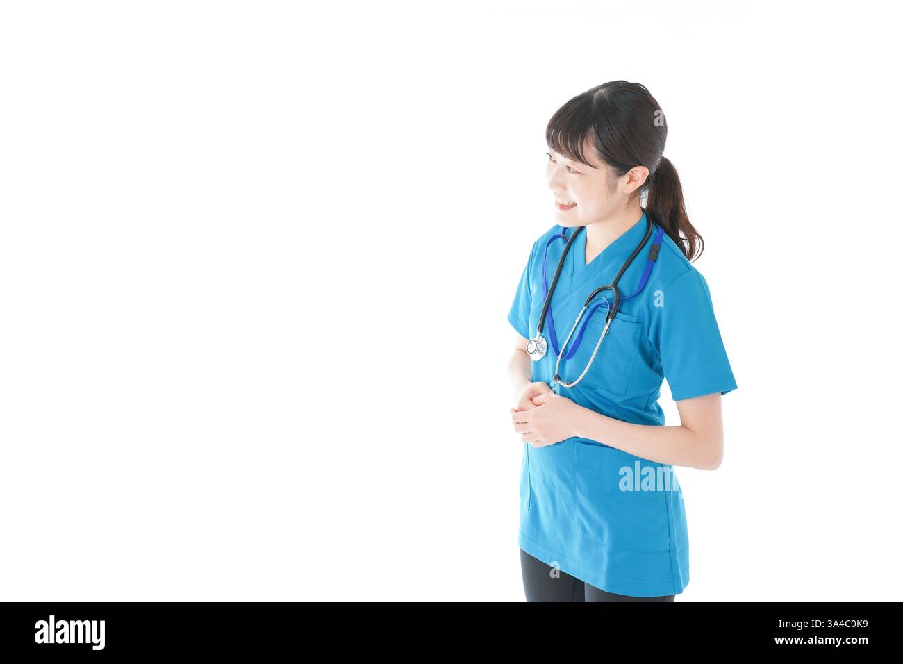 Lächelnde junge Krankenschwester Stockfoto