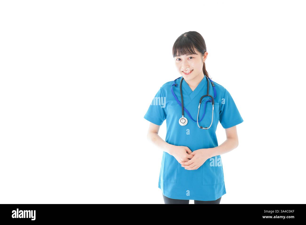 Lächelnde junge Krankenschwester Stockfoto